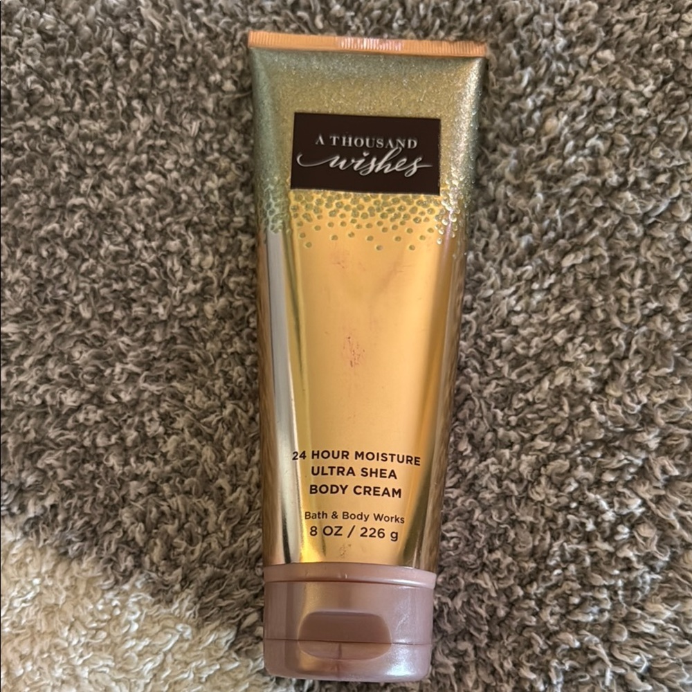 Bath & Body Works “ A Thousand Wishes” body cream! Almost full! Used once!